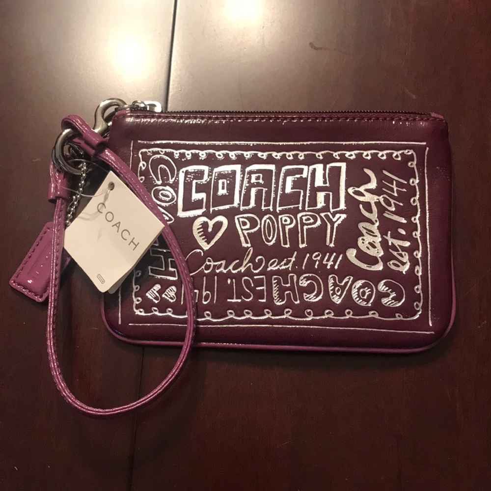 Purple Coach wristlet